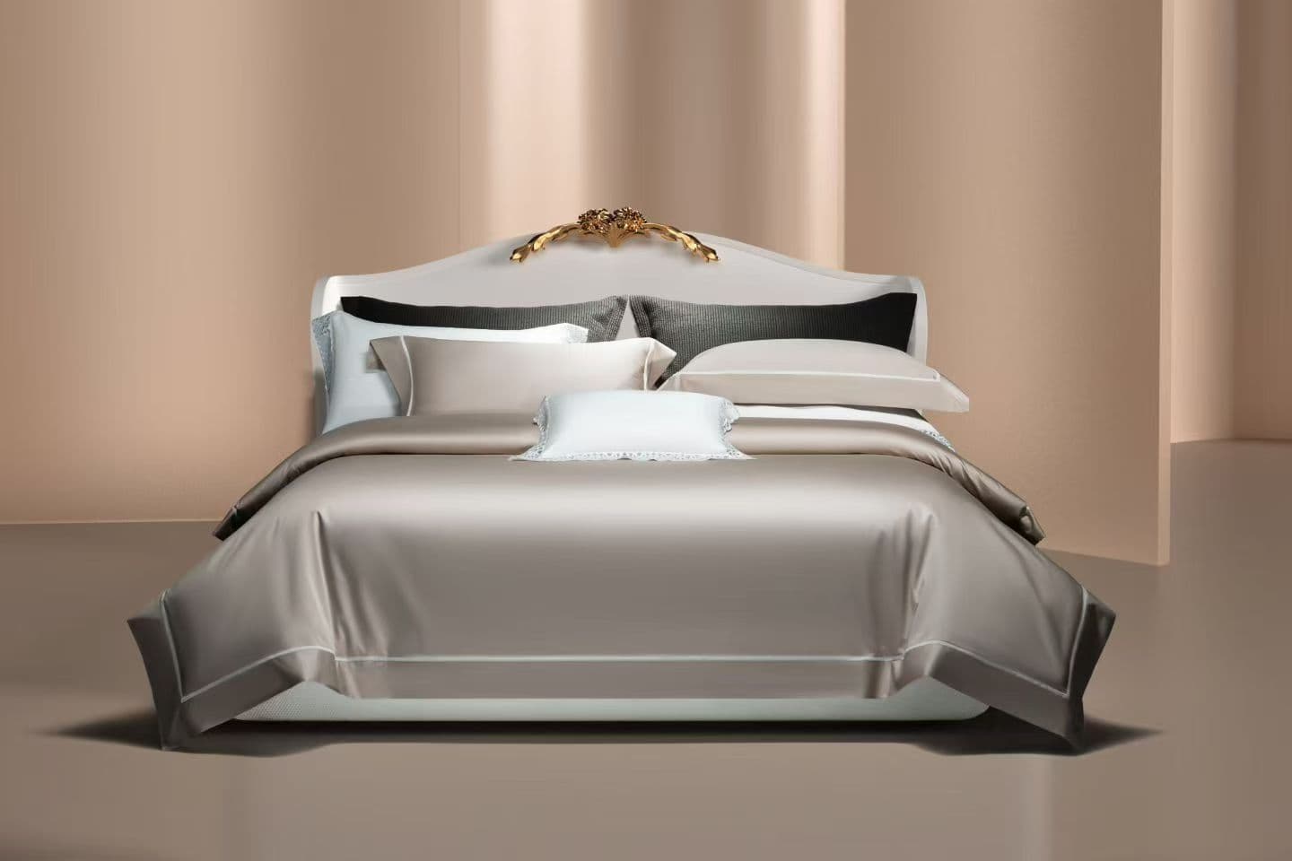 Neutral hotel bedding styled for a premium hospitality setting